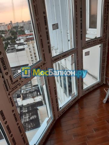 Остекление панорамной лоджии  от пола REHAU